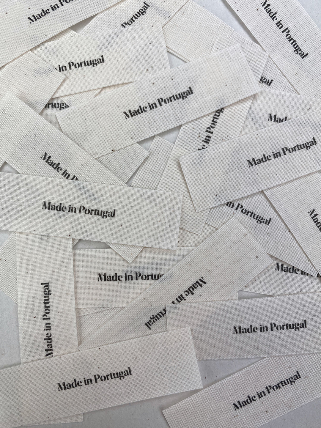 Close-up photo of textile clothing labels for custom woven label branding