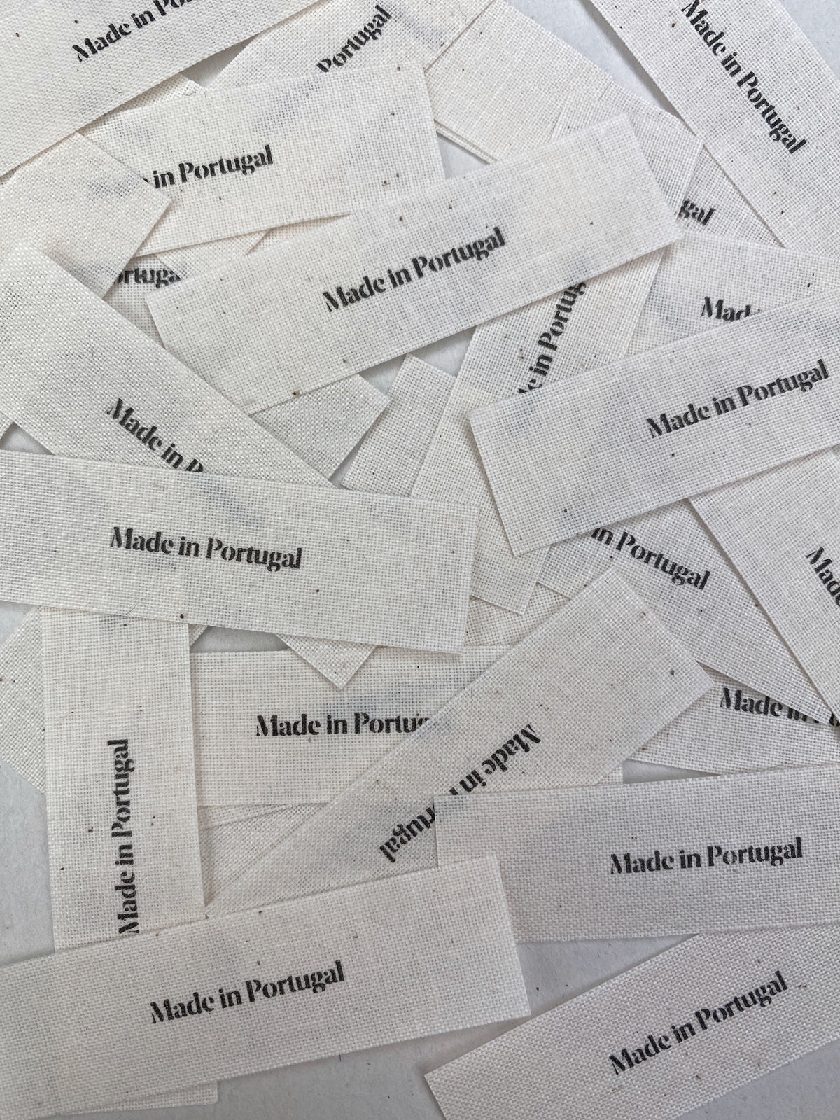 Close-up photo of textile clothing labels for custom woven label branding